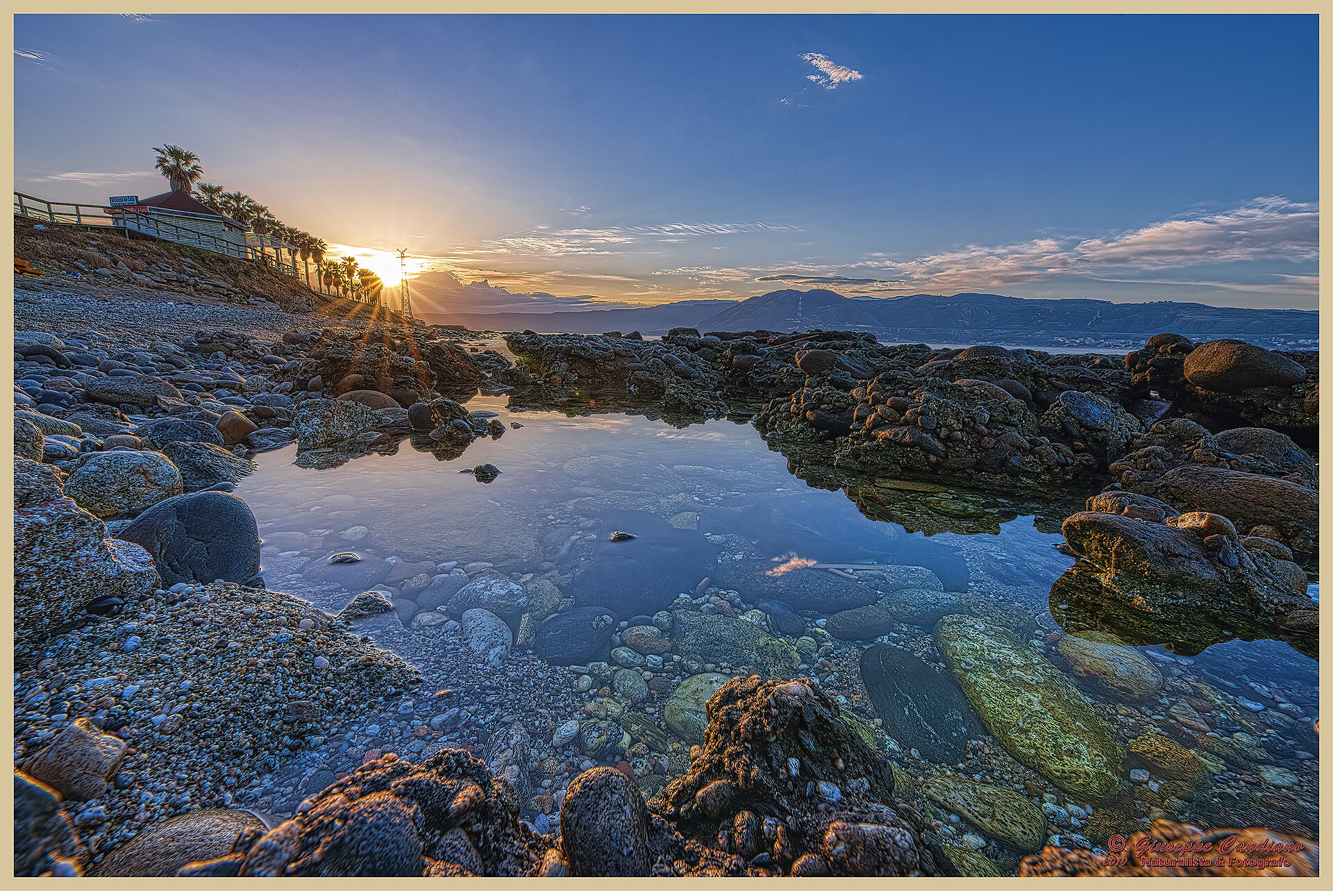 Sunset over the Strait of Messina at Capo Peloro